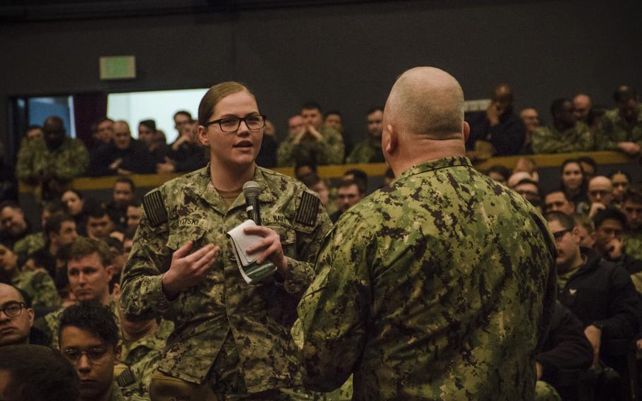 A sailor speaks about suicide with Master Chief Petty Officer of the Navy James Honea during an all-hands call at Yokosuka Naval Base, Japan, Feb. 10, 2023. 
