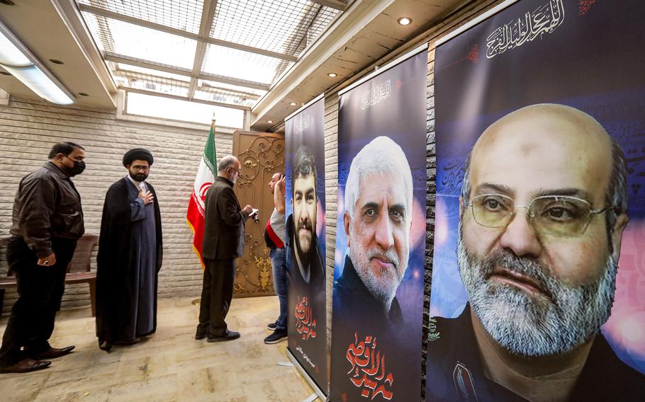 Posters depicting victims of an airstrike on the consular annex of the Iranian embassy’s headquarters in Damascus are displayed during a memorial service for them at the premises in the Syrian capital on Wednesday, April 3, 2024. 