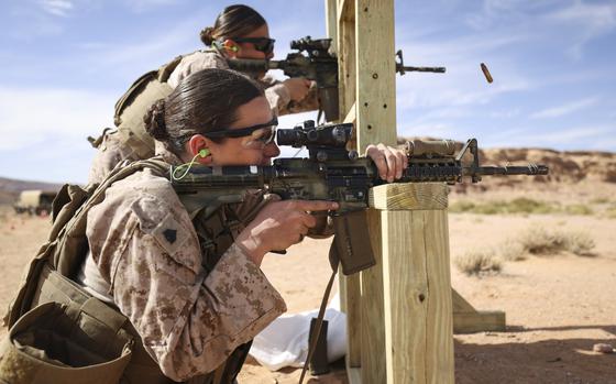 U.S. Marine Corps Sgt. Angela Scolari, front, a combat marksmanship coach assigned to 6th Air Naval Gunfire Liaison Company, Force Headquarters Group, U.S. Marine Corps Forces Reserve, fires a rifle during an all-female marksmanship subject matter expert exchange between U.S. Marines and Jordanian Soldiers during Intrepid Maven 25.1 in Al-Quwayrah, Jordan, Oct. 29, 2024. The second iteration of this exchange between U.S. and Jordanian female engagement teams was nested in Intrepid Maven 25.1 and represents a step forward in strengthening military cooperation and promoting Women, Peace, and Security initiatives. (U.S. Marine Corps photo by Sgt. Angela Wilcox)