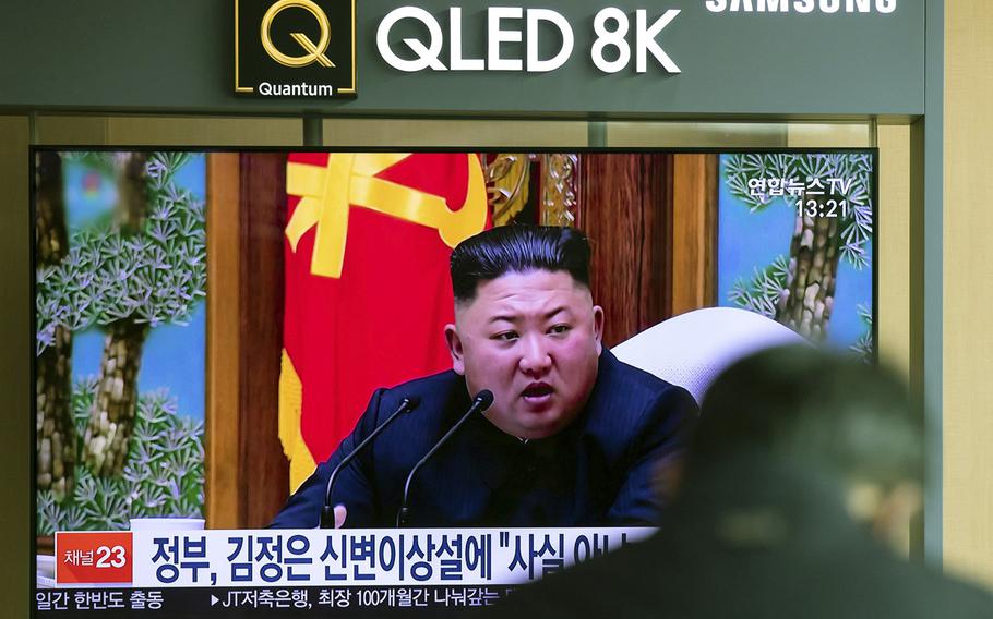 A screen displays a broadcast of a news report featuring North Korean leader Kim Jong Un at Seoul Station in Seoul, South Korea, on April 21, 2020.