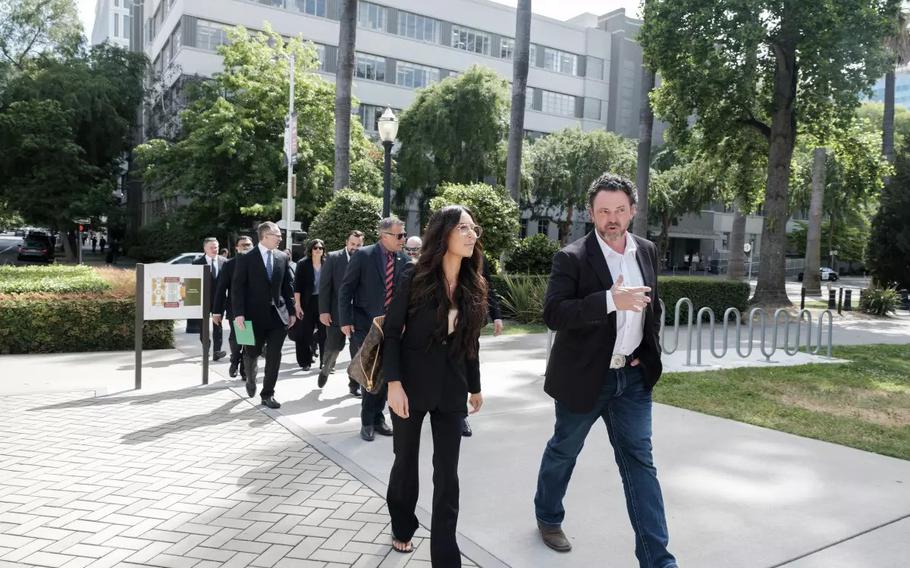 People in suits walking