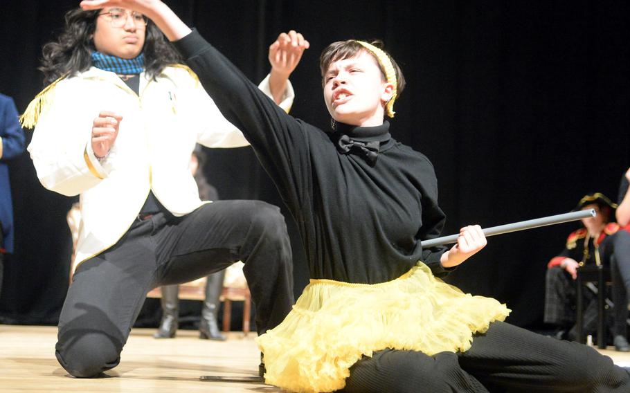 Romeo, portrayed by Zama Middle-High School's Justin Iriarte, and Corban Olson play out the scene of Mercutio's death, during their performance of the one-act play "Romeo and Juliet: Six Very Busy Days," during the Far East Drama Festival at Camp Humphreys, South Korea, Feb. 9, 2023.