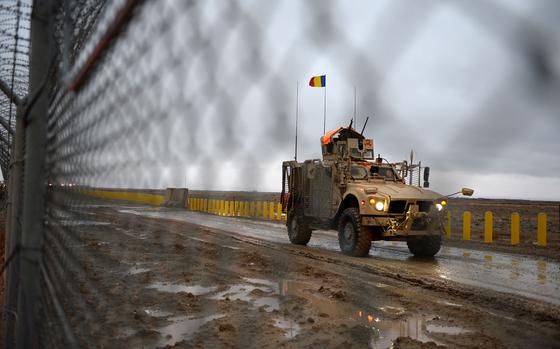 Kandahar Airfield, Afghanistan, Feb. 13, 2014: A Romanian vehicle drives just outside Kandahar Air Field, Afghanistan. Days of rain and snow have turned unpaved ground to cold mud and brought flight operations to a halt at the airfield. 

Read the story and check out additional photos here:
https://www.stripes.com/news/in-afghanistan-snow-in-desert-brings-operations-to-halt-1.267691

META TAGS: Afghanistan; Operation Edurung Freedom; Wars on Terror; U.S. Air Force; Task Force Demon 