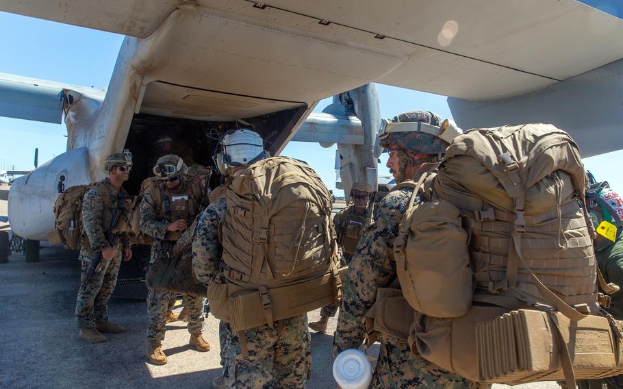 U.S. Marines board an MV-22B Osprey at Royal Australian Air Force Base Darwin, Australia, May 26, 2021.