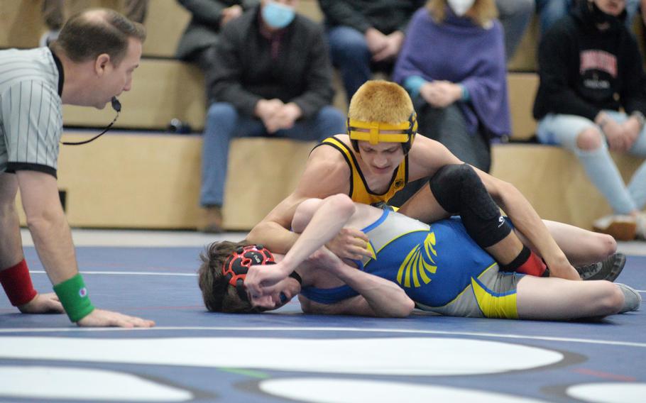 Stuttgart’s Brayden Aperauch, top, beat Wiesbaden’s Luca Pitaniello for the 106-pound title at the high school 2022 Wrestling Tournament in Ramstein, Germany, Feb. 12, 2022.