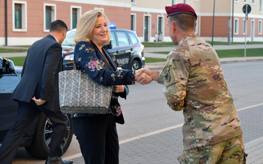 Maj. Gen. Andrew M. Rohling, the Army Southern European Task Force commander, Africa, welcomes Army Secretary Christine Wormuth in front of the SETAF-AF headquarters during a recent visit to Caserma Del Din in Vicenza, Italy, on Oct. 29, 2021. 