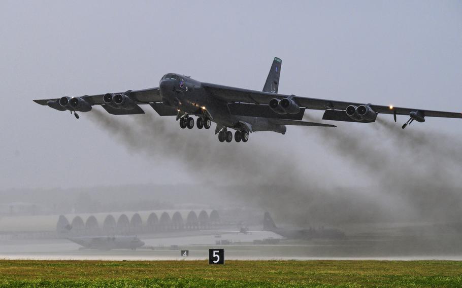 A U.S. Air Force B-52 Stratofortress takes off from Andersen Air Force Base, Guam, on Feb. 2, 2021. A U.K. group of researchers has launched a website detailing the carbon emissions of militaries worldwide. The group says most militaries aren’t accurately reporting their data.