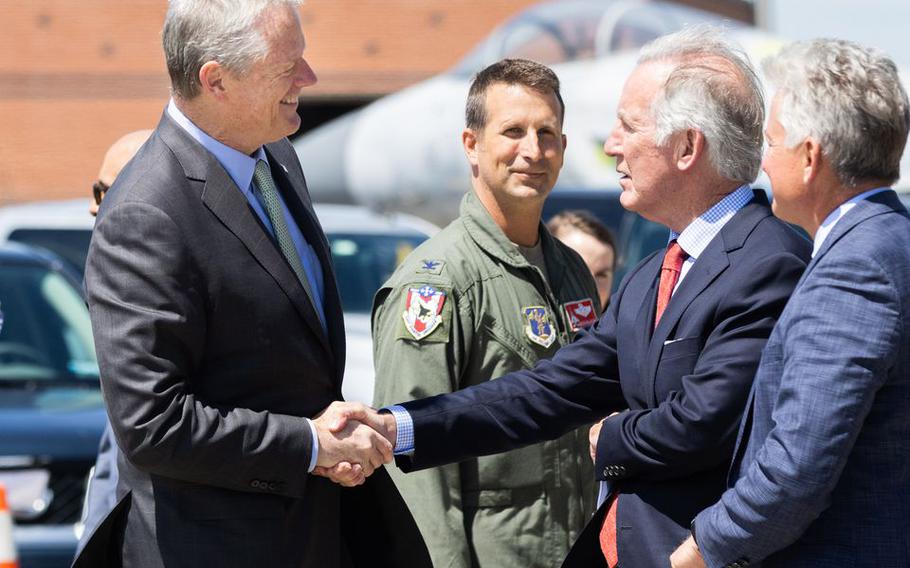 Massachusetts Gov. Charlie Baker (left) greets congressman Richard E. Neal (right) prior to the ceremonial groundbreaking of a new Taxiway Sierra at Westfield-Barnes Regional Airport on Thursday, May 27, 2021.