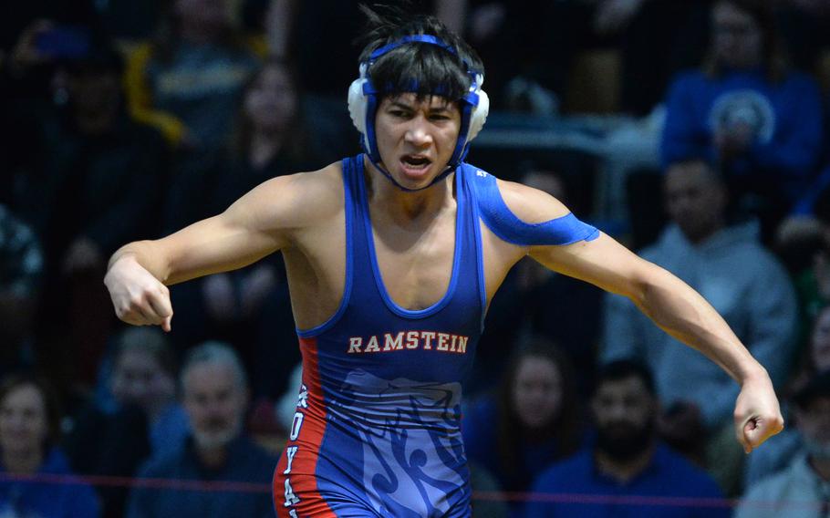 Ramstein’s Joshua Conway celebrates after defeating Stuttgart’s Aidan Morgan in the 126-pound final at the DODEA-Europe wrestling championships, in Wiesbaden, Germany, Feb. 11, 2023. 