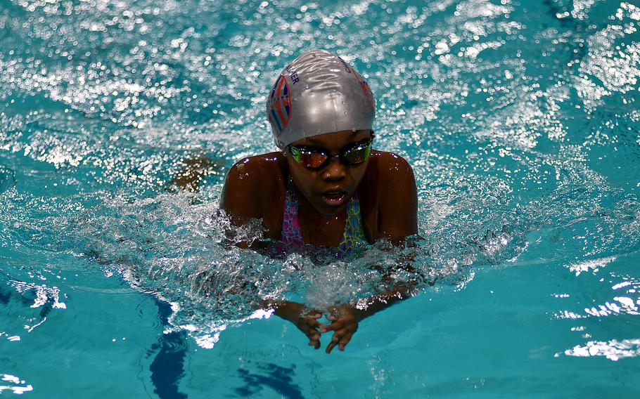 Kaiserslautern Kingfish Addy Pierre-Louis swims the breastsroke leg of the 9-year-old girls 100-meter individual medley during the European Forces Swim League Short-Distance Championships on Feb. 10, 2024,  at the Pieter van den Hoogenband Zwemstadion at the Nationaal Zwemcentrum de Tongelreep in Eindhoven, Netherlands.