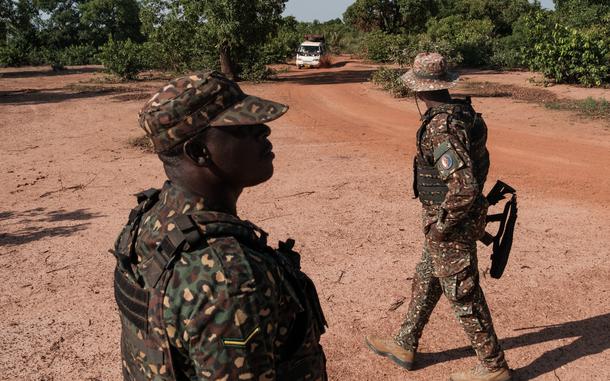 Members of the Ghana Immigration Service patrol their country’s porous border with Burkina Faso, inspecting cars crossing in Gwollu, Ghana. MUST CREDIT: Guy Peterson/For The Washington Post