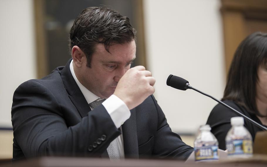 Army Green Beret Sgt. 1st Class Richard Stayskal, suffering from terminal lung cancer, pauses to hold back tears while testifying during a hearing on Capitol Hill in Washington on April 30, 2019.