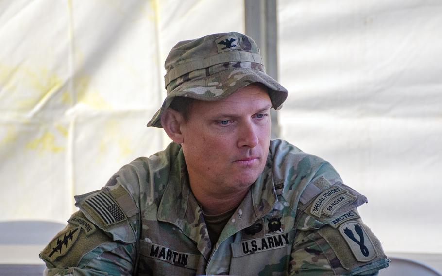 U.S. Army Col. Bryan Martin, operations group commander for the Joint Pacific Multinational Readiness Group, speaks to reporters about force-on-force training in Townsville, Australia, July 24, 2023.