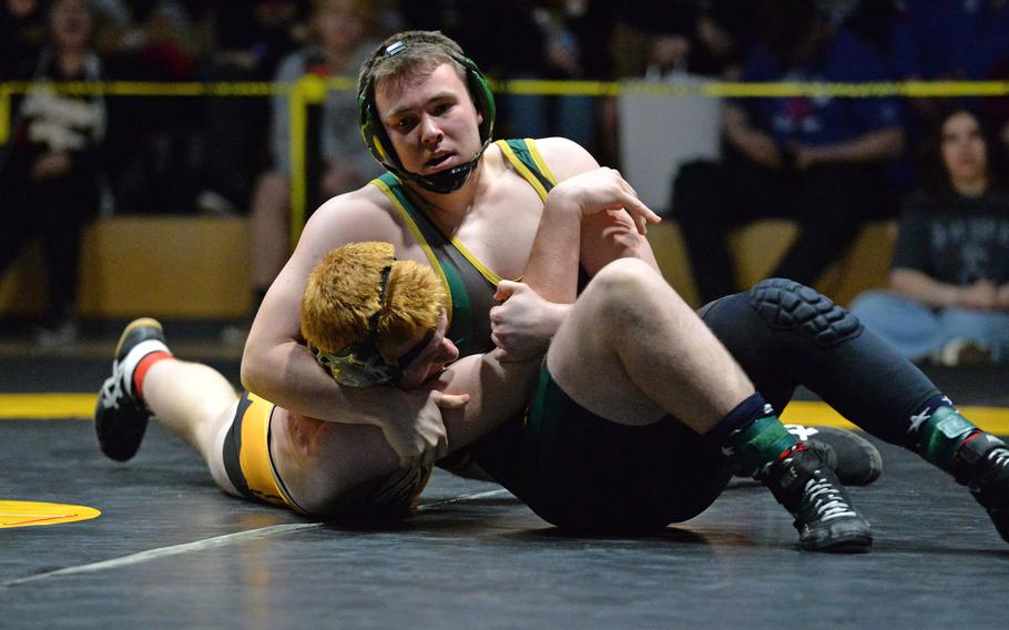 SHAPE’s William Bush, right,  won the 215-pound title match at the DODEA-Europe wrestling finals in Wiesbaden, Germany, Feb. 10, 2024, defeating Stuttgart’s Conner Hutchinson.