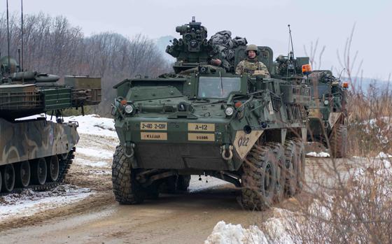 U.S. Army Strykers move into position during live-fire training at Nightmare Range in Pocheon, South Korea, on Jan. 4, 2024.