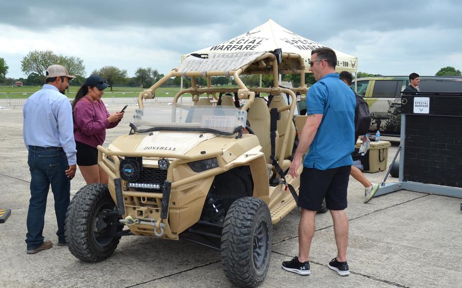 Visitors check out the MRZR Diesel “Razor” ultra-light turbo combat vehicle used by Air Force special warfare members at The Great Texas Airshow on Saturday, April 6, 2024, at Joint Base San Antonio-Randolph Air Force Base.