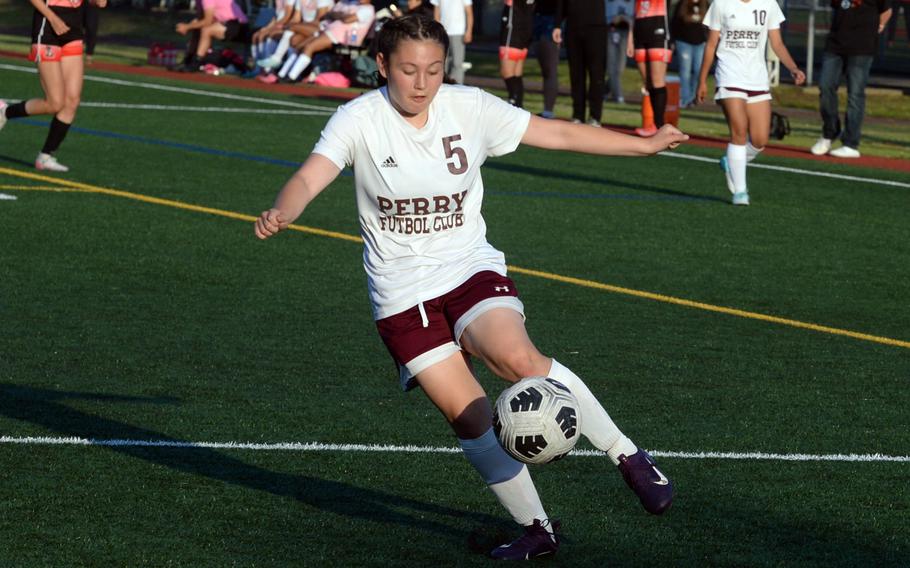Priscilla Ramirez tries to control the ball.