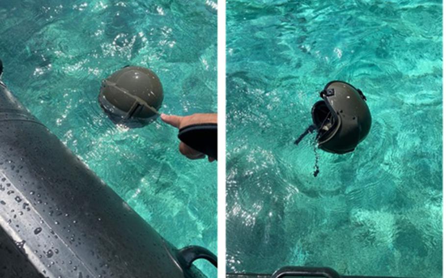 A flight helmet belonging to a crew member from a missing UH-60JA Black Hawk was found along the northeast side of Irabu Island, Okinawa, Sunday, April 9, 2023.