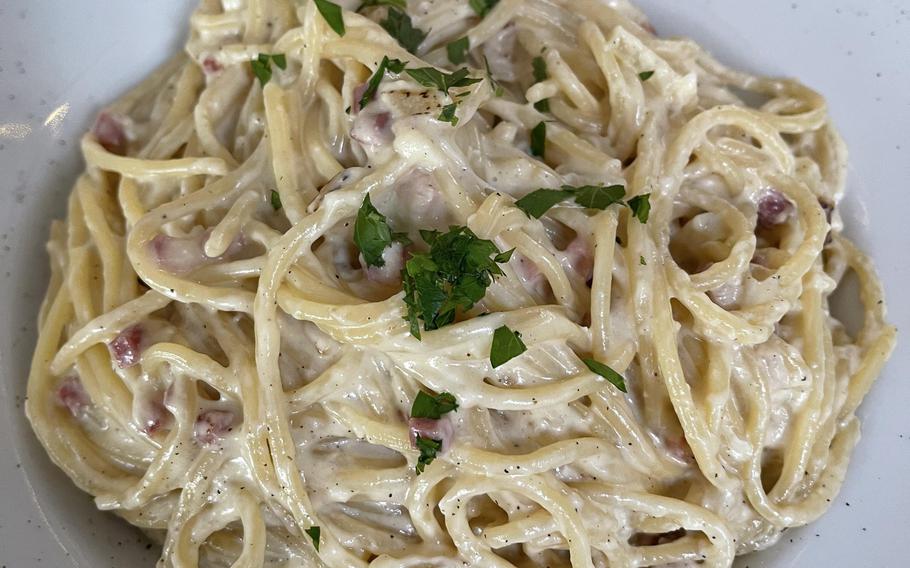 Spaghetti carbonara at L'Italiano restaurant in Weiden, Germany, Feb. 16, 2022. 