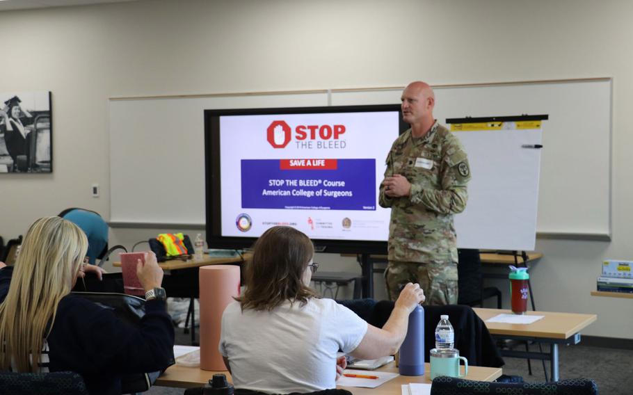 Dr. Quinton Hatch, general surgery program director at Madigan Army Medical Center at Joint Base Lewis-McChord, Wash., teaches a course on traumatic injury care to health professionals with Peninsula School District. The course is part of a Defense Department-supported program called Stop the Bleed, which teaches civilians lessons on trauma care the military has developed for troops in combat zones. 