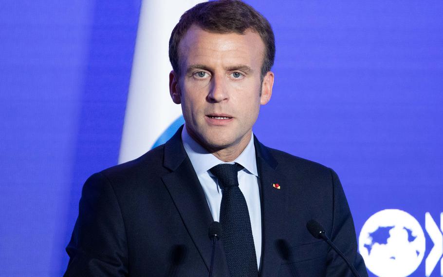 French President Emmanuel Macron attends a briefing in Paris on May 30, 2018. 