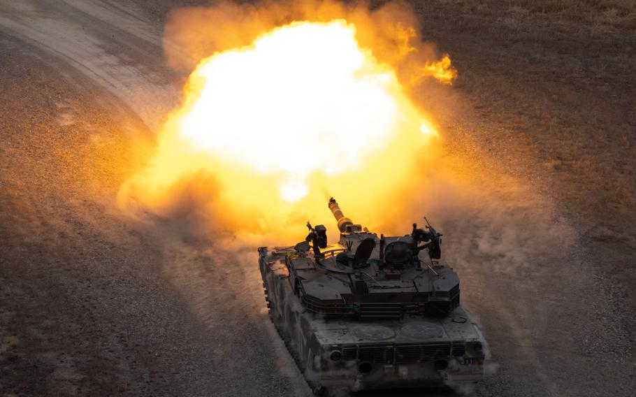 A South Korean army K1A1 tank, manufactured by Hyundai Rotem Co., fires during a joint live-fire exercise with the U.S. Army at Rodriguez Range in Pocheon, South Korea, on Wednesday, March 22, 2023.