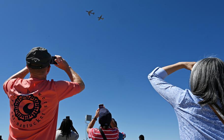 People watch aerial performances