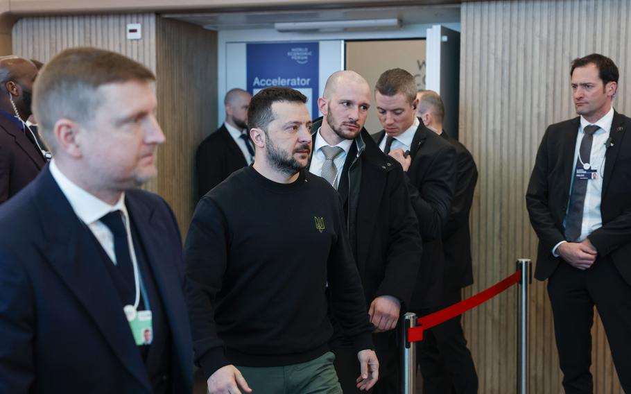 Volodymyr Zelenskyy, Ukraine’s president, center, is escorted by security from a bilateral meeting on the opening day of the World Economic Forum (WEF) in Davos, Switzerland, on Tuesday, Jan. 16, 2024.