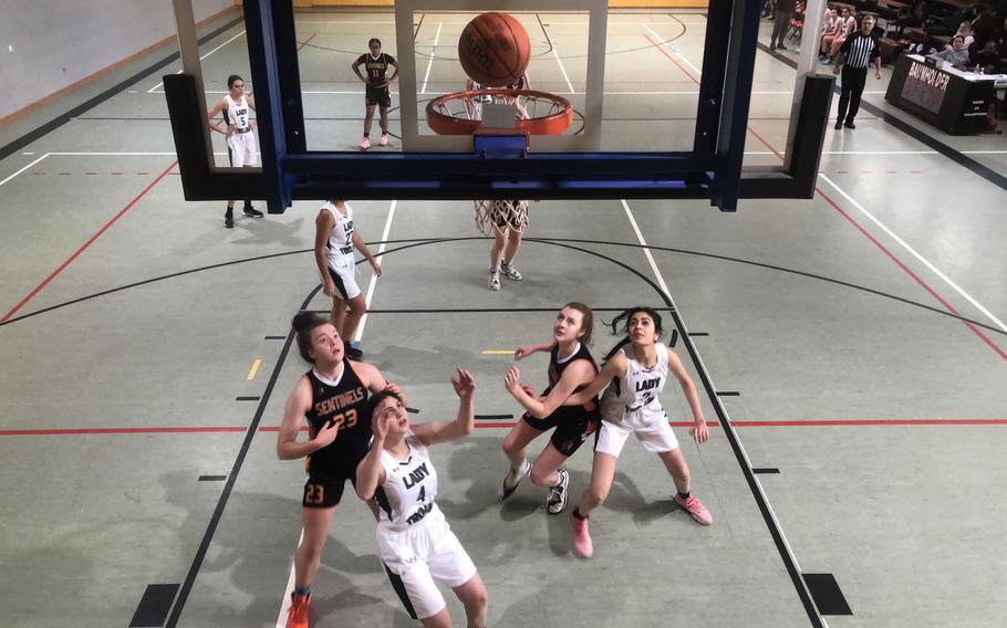 Players from Ankara and Spangdahlem battle for a rebound in the opening game of the DODEA-Europe Division III girls basketball tournament Wednesday, Feb. 15, 2023.
