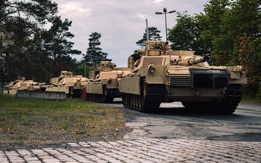 U.S. M1A1 Abrams tanks used for training Ukrainian troops await transport to Grafenwoehr, Germany, in May 2023. Sen. Mitch McConnell, R-Ky., said Sept. 27, 2023, that former President Donald Trump is largely at fault for the decline in GOP enthusiasm for supplying Ukraine with weapons. 