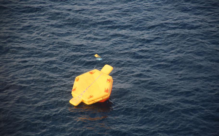 The Japanese coast guard found a 20-person life raft near an unconcious person after an Air Force CV-22 Osprey went down in waters in southwestern Japan, Wednesday, Nov. 29, 2023.
