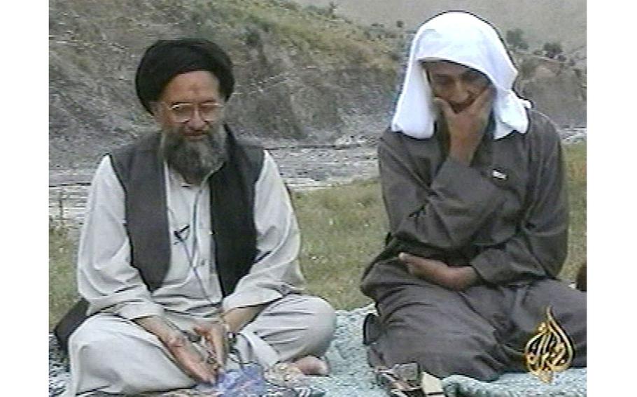 Osama bin Laden, right, and top deputy Ayman al-Zawahri, left, on television, April 15, 2002, Jalalabad, Afghanistan. (Al-Jazeera/Zuma Press/TNS)