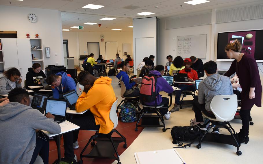 A classroom at DODEA with students sitting at tables.
