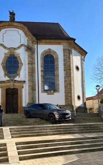An American driver followed his car’s GPS around a construction zone and found himself on the front steps of St. Aegidius parish church near the market square in Vilseck, Germany, on Oct. 27, 2022, according to local police. The town has a large U.S. Army presence.