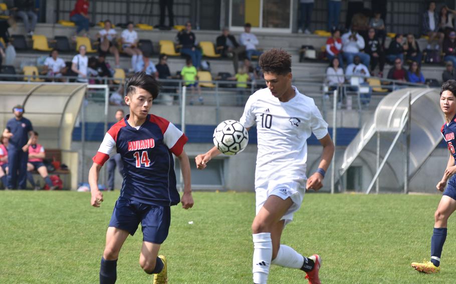 Vicenza's Kaya Peterson shows off some of his dribbling skills while moving up the field as Aviano's Keoni Andres defends on Saturday, April 22, 2023.