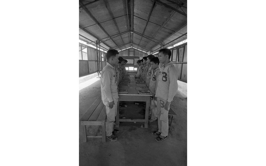 Viet Cong and North Vietnamese Army POWs have access to "Free World" magazines in the library of the Bien Hoa POW camp.