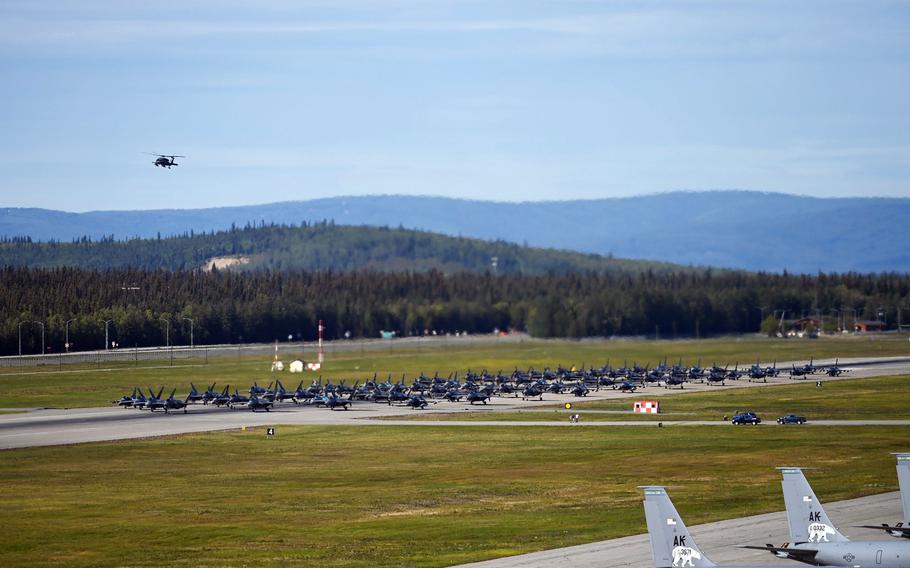 F-16 Fighting Falcons, F-22 Raptors and F-35 Lightning IIs take part in a large formation exercise at Eielson Air Force Base, Alaska, Aug. 12, 2022.