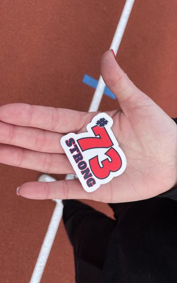 A #73 STRONG sticker, the jersey number for Kaiserslautern High School sophomore football player Aiden Wall