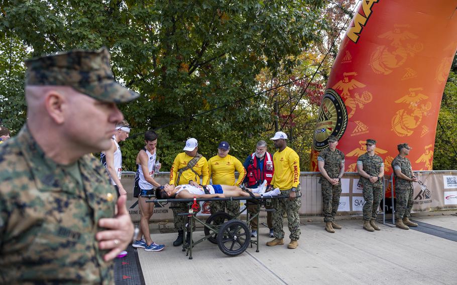 A competitor is helped off the course