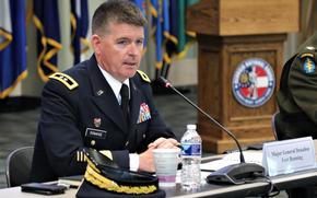 Army Maj. Gen. Patrick Donahoe speaks at Clay National Guard Center in Marietta, Ga., April 22, 2021. Donahoe was criticized in a recent Defense Department Inspector General report for his 2021 Twitter posts in response to a right-wing pundit's comments that the Army was becoming "too feminine." 