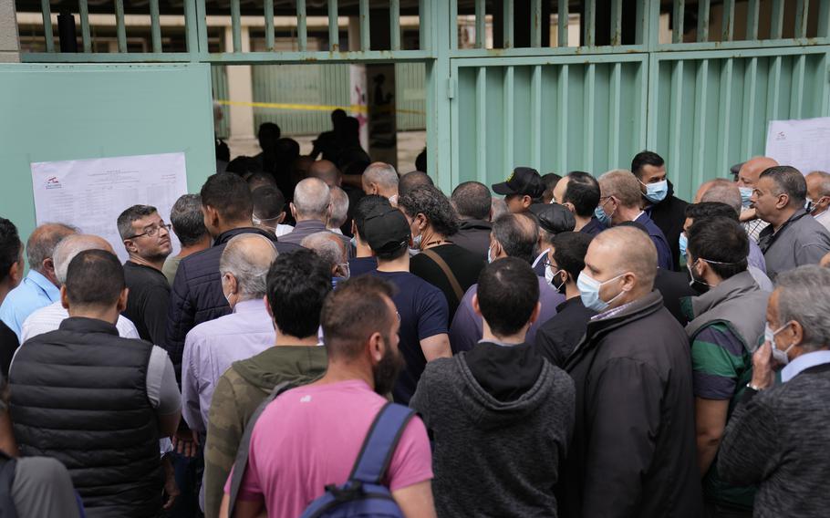 People line up to vote during parliamentary elections in Beirut, Lebanon Sunday, May 15, 2022. 