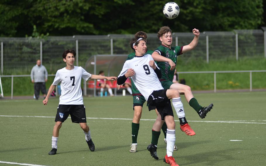 Hohenfels defender Connor Landreth and AFNORTH captain Santiago Aponte tussle for a corner kick during the second day of pool-play action at the 2025 Division III DODEA European championships on May 20, 2025, at Rothenborn Stadion in Landstuhl, Germany.