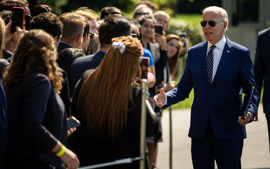 President Joe Biden greets guests after disembarking from Marine One, returning to the White House from Rehoboth, Del., on the South Lawn of the White House on Aug. 24, 2022, in Washington, D.C. 