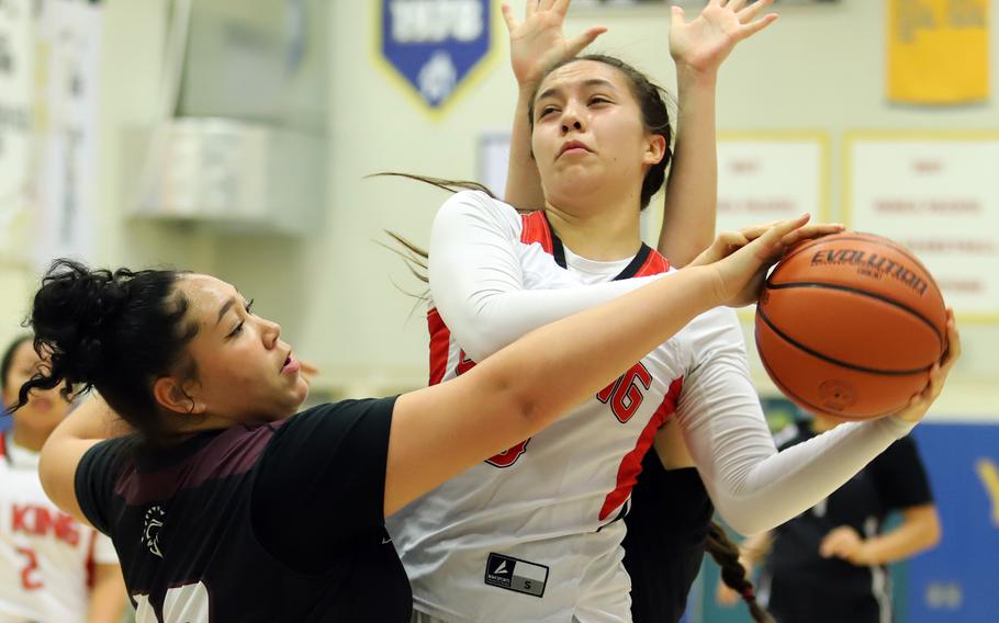 The road to the Cobras' first Far East Division II championship in 27 years wasn't easy, but close games prepared King's Maliwan Schinker (5) and her teammates for the tougest test of all.