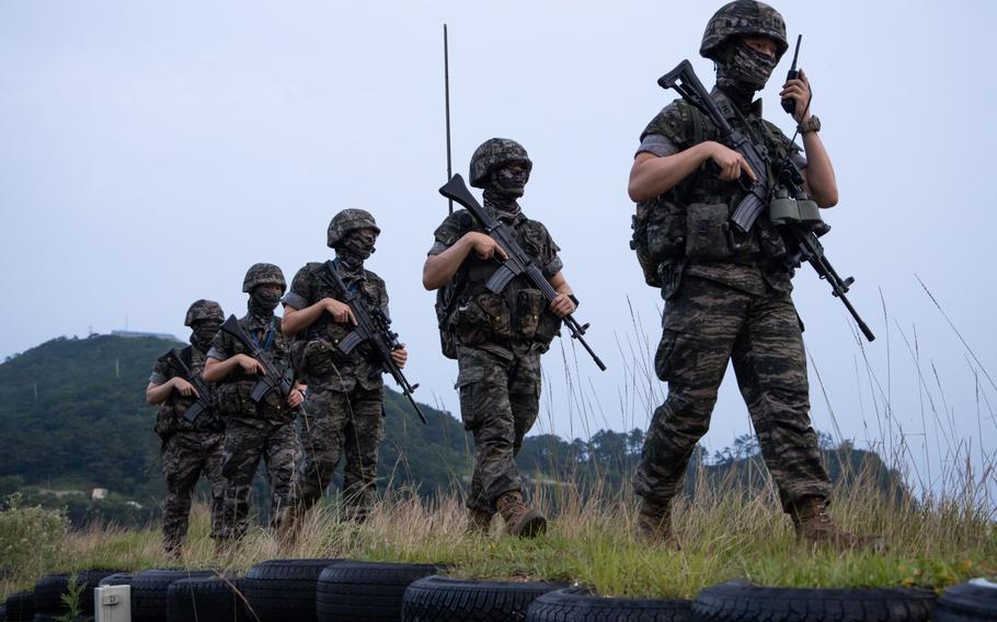 South Korean Marine Corps soldiers patrol Guridong beach on Yeonpyeong Island, South Korea, on June 26, 2020.