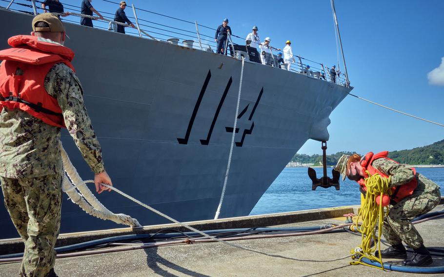 The guided-missile destroyer USS Ralph Johnson arrives at its new homeport, Yokosuka Naval Base, Japan, Monday, Oct. 4, 2021.