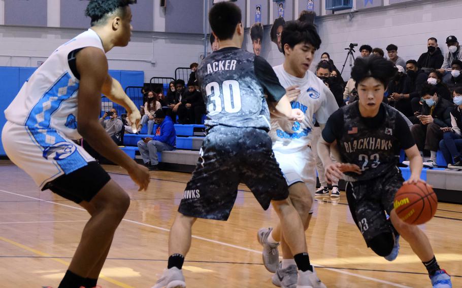Senior guard Simon Song, with ball, scored 64 points, setting a new DODEA-Korea league single-game record, during Saturday’s 94-10 win over Daegu; the Blackhawks earlier lost 66-64 to Osan.