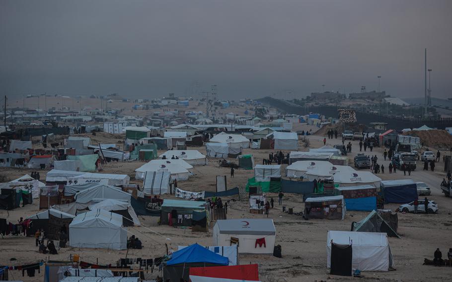 Tents housing displaced Palestinians near the border separating the Gaza Strip and Egypt in the Rafah refugee camp on Tuesday, Feb. 13, 2024.