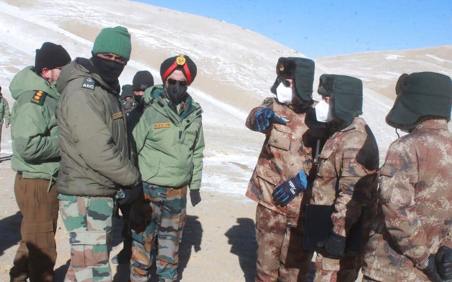 Indian and Chinaese officers meet at Pangong lake region in Ladakh on the India-China border on Feb. 10, 2021. 