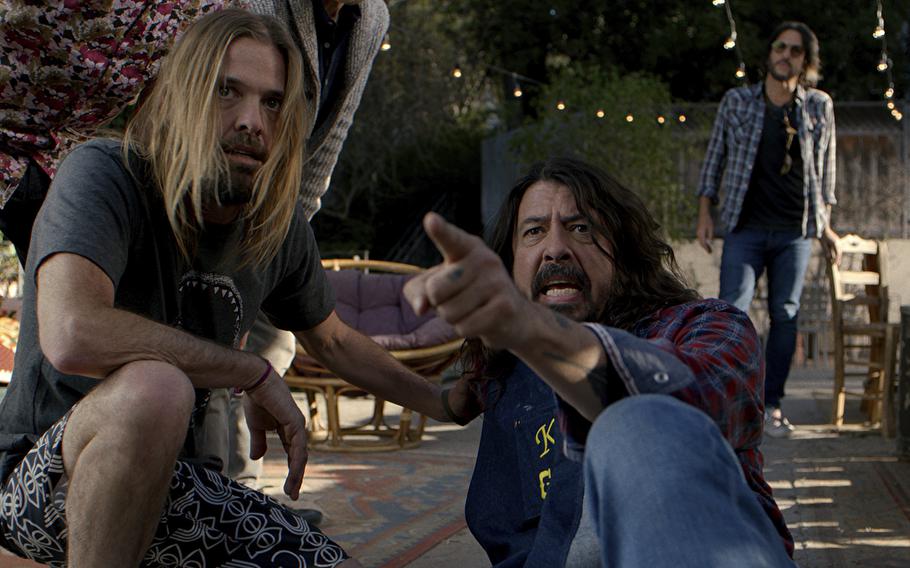 This image released by Open Road Films shows Taylor Hawkins, left, and Dave Grohl in “Studio 666.” 